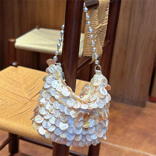 Sac de soirée chic et moderne, le cadeau idéal pour illuminer ses fêtes