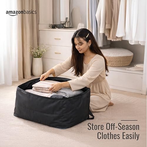Image of amazon basics 69L Large Storage Bag (Pack Of 2) | Moisture Proof Nylon Big Storage Bag For Clothes With Wide Handles | Wardrobe Packing Container for Winter Blankets | 54x46x28 cm | Blue