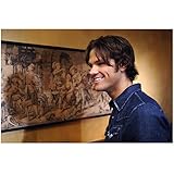 Supernatural Jared Padalecki as Sam Winchester Smiling Next to Painting 8 x 10 Photo