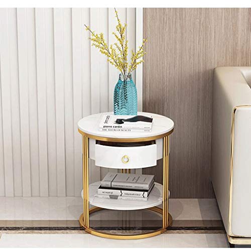 Table basse en marbre blanc avec tiroir pour optimiser l'espace du salon