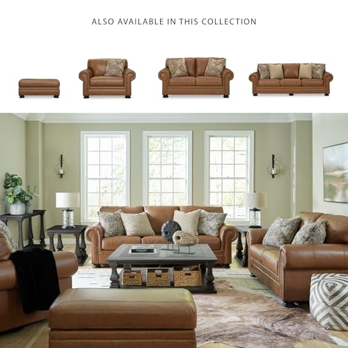 Image of Signature Design by Ashley Carianna Oversized Leather Accent Chair, Caramel | Top-grain leather seating, Durable faux leather outer panels, Extra-wide 54 in frame, Traditional living room style