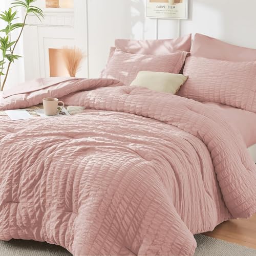 Image of HYMOKEGE Rose Gold King Size Comforter Set Seersucker 7 Pieces, All Season Luxury Bed in a Bag for Bedroom, Bedding Set with Comforters, Sheets, Pillowcases & Shams