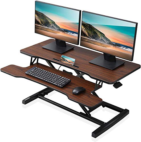 Image of FITUEYES Height Adjustable Standing Desk 36 inch Wide Sit to Stand Converter Stand Up Desk Tabletop Workstation for Laptops Dual Monitor Riser Brown SD309102WE
