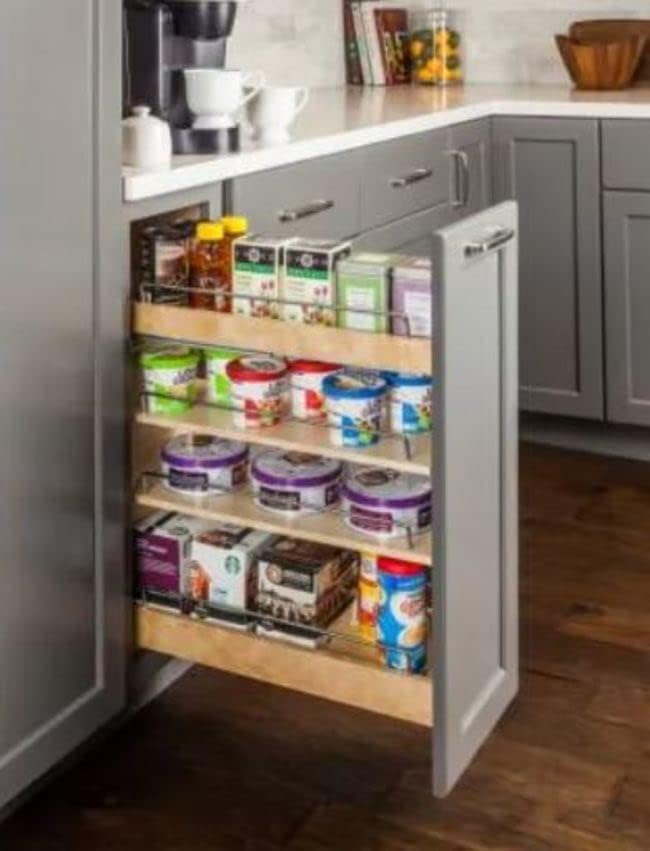 The Hardware Resources Base Cabinet Pullout unit, showing its wooden frame, metal shelves, and slide mechanisms.