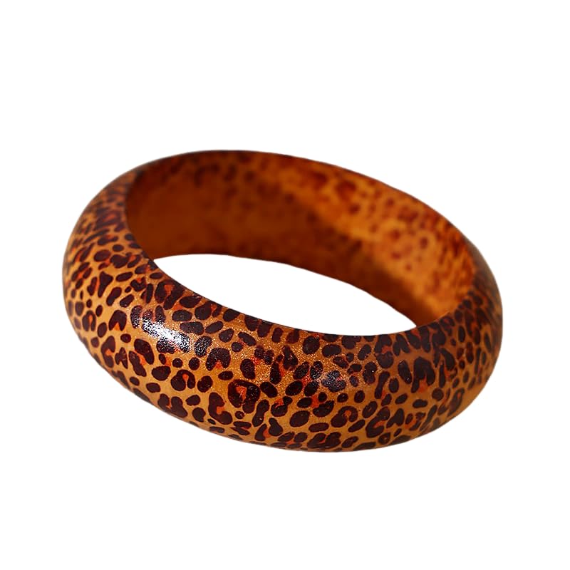 Bracelet jonc ethnique en bois sculpté pour parfaire votre look bohème au quotidien