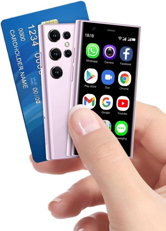 Hand holding the S23 Pro Mini Smartphone next to a credit card, illustrating its small size
