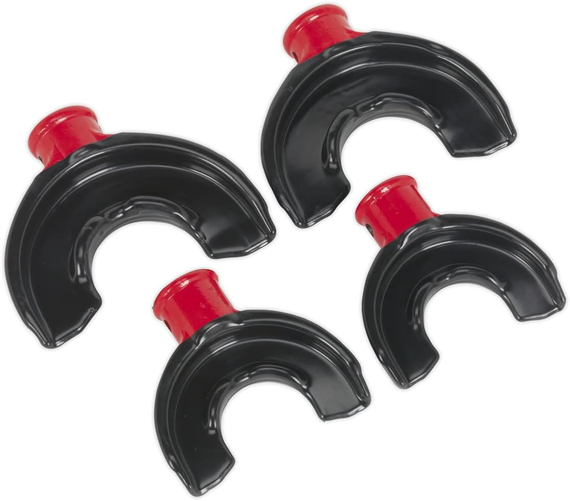 Plastic-coated yokes for spring compression