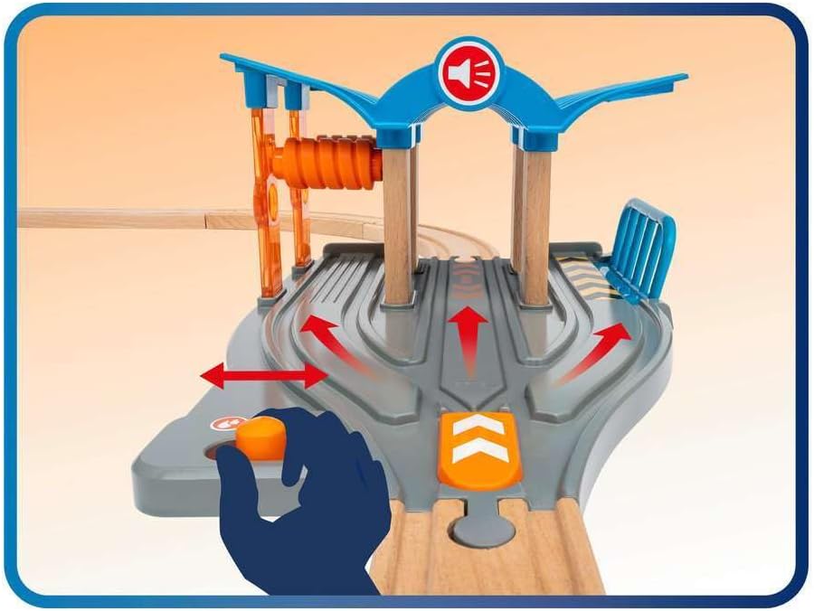 Hand operating the orange lever on the BRIO 33975 Smart Tech Sound Train Service Station