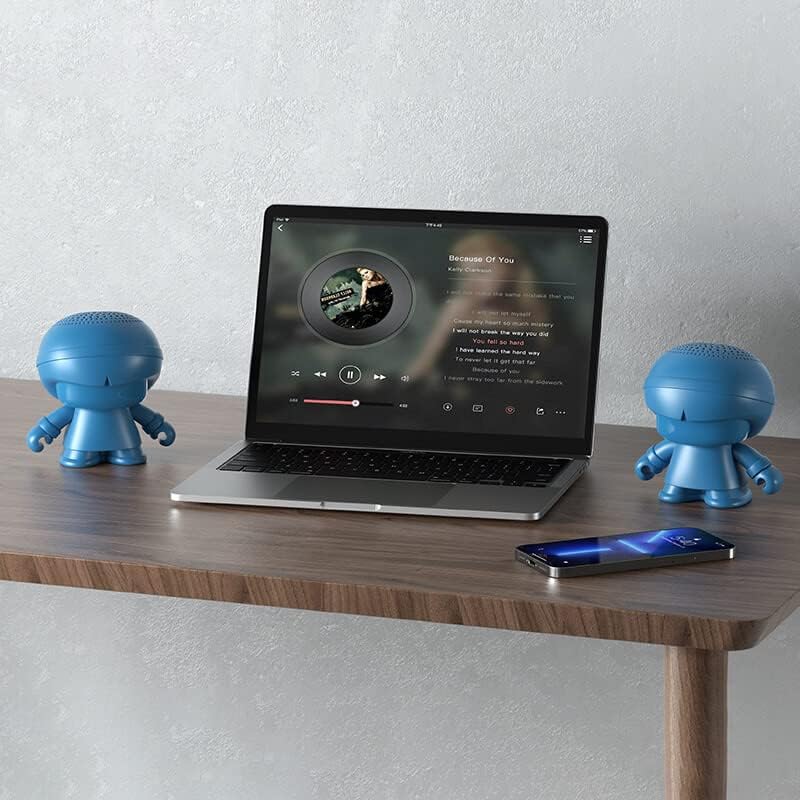 Two Xoopar Xboy-R speakers paired with a laptop