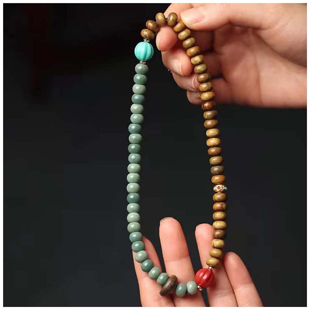 Bellissimo braccialetto Buddha con doppia perla in legno di sandalo