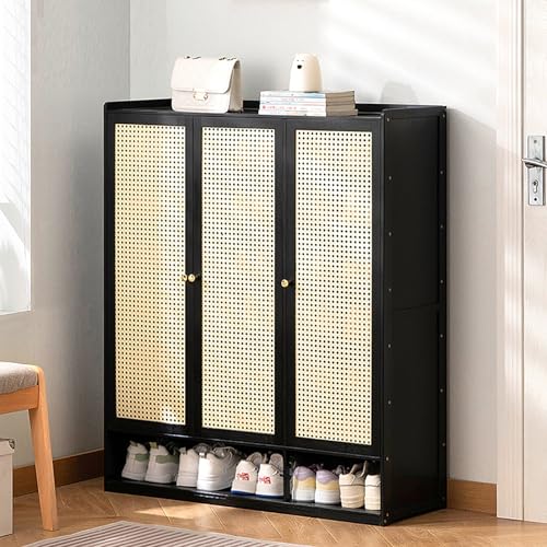 Meuble à chaussures en bois noir et rotin à l'entrée de la maison