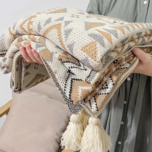 Couverture bohème rétro avec pompons d'angle et palette de couleurs ethniques
