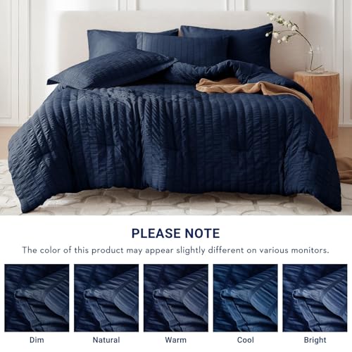 Image of MUXHOMO 7 Pieces King Comforter Set, Seersucker Bed in a Bag King Size, All Season Luxury Bedding Set with Comforter, Flat Sheet, Fitted Sheet, Pillowcases & Shams, Navy Blue