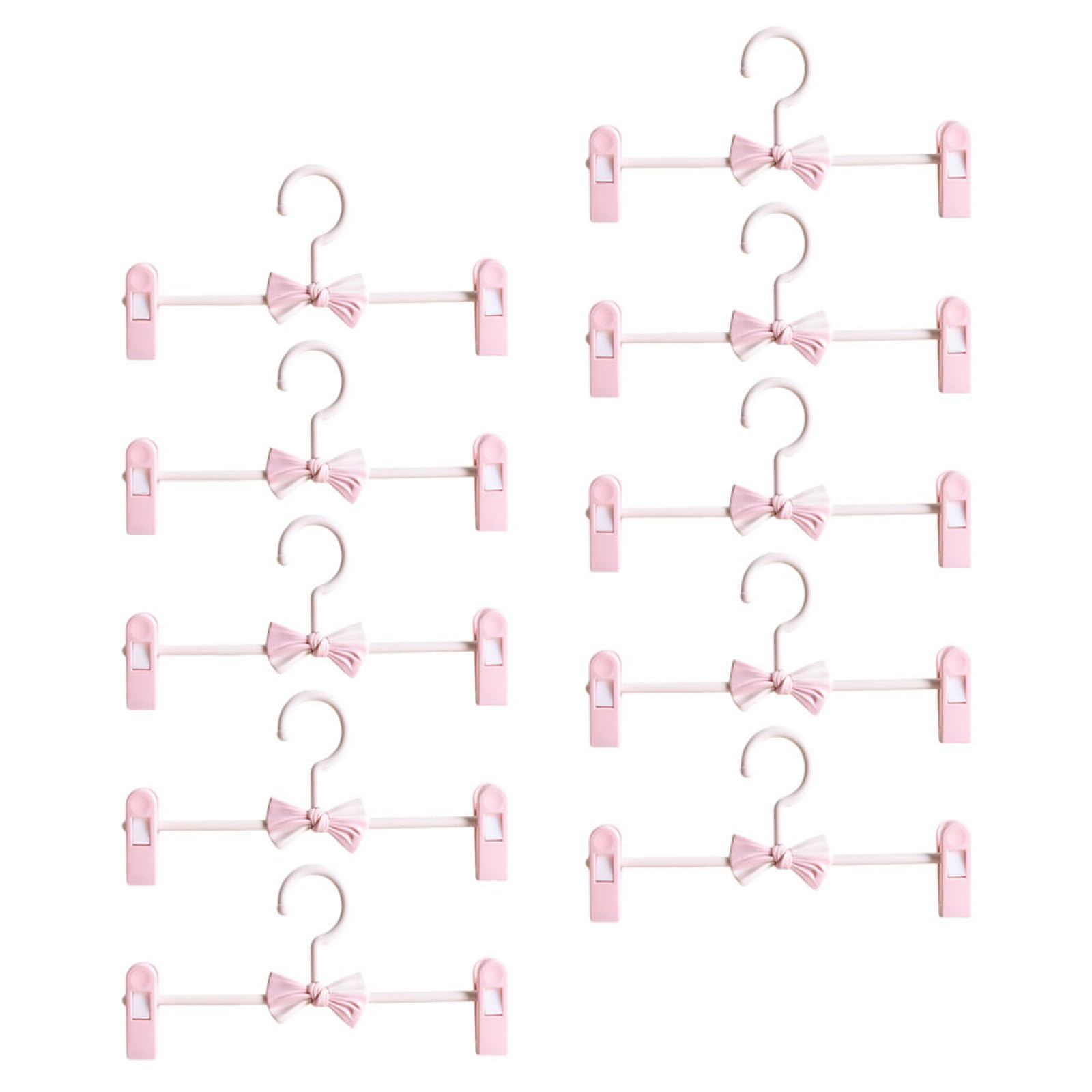 Cintre à pince réglable rose : fini les jupes qui tombent du dressing familial
