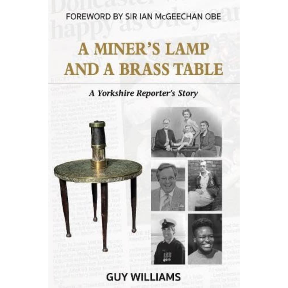 A Miners Lamp and a Brass Table