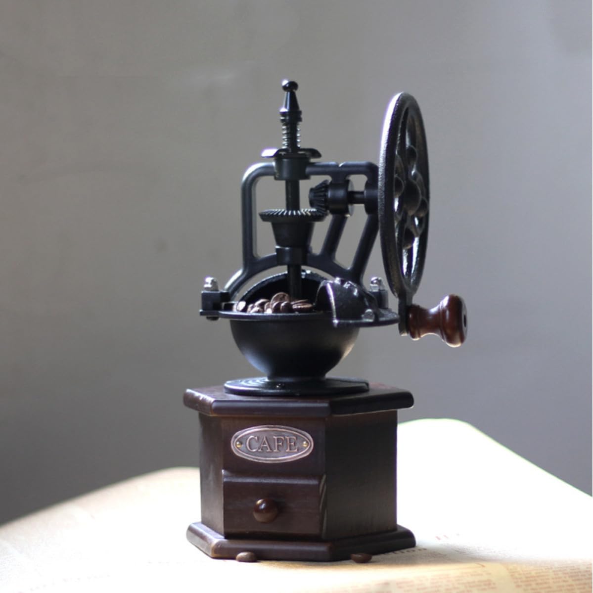 KICHOUSE Molinillo Manual Portátil de Hierro Diseño Ergonómico y Forma de Rueda Fortuna para Moler Granos de Café y Especias Manivela Cómoda