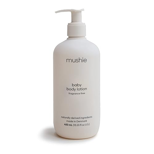mushie Baby Organic Body Lotion Hidrata, calma e hidrata la piel seca Fabricado en Dinamarca, 13.53 onzas líquidas (sin fragancia)