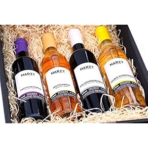 Elegante Geschenkbox mit 4 Fruchtweinen (Zwetschke, Quitte, Holunderbeere, Gelbe Himbeere – vegan)