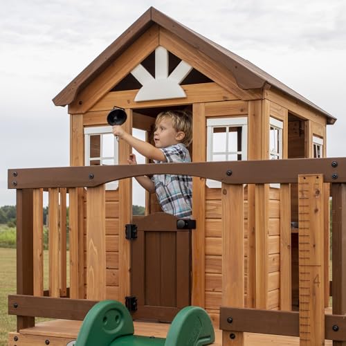 Image of Backyard Discovery Echo Heights Elevated Cedar Wooden Kids Playhouse with Wave Slide, Play Kitchen, Wrap-Around Deck, Flat-Step Ladder, Half Door, Windows, Bell, and Growth Chart for Outdoor Play
