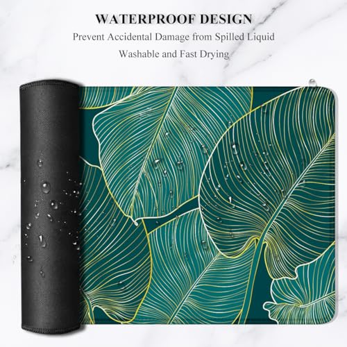 Image of Auhoahsil Desk Pad, XL Extended Large Gaming Mouse Pad 31.5 x 11.8 Inch, Waterproof Mousepad with Stitched Edge, Non-Slip Computer Keyboard Laptop Mat for Women Men Office Work, Teal Tropical Leaves