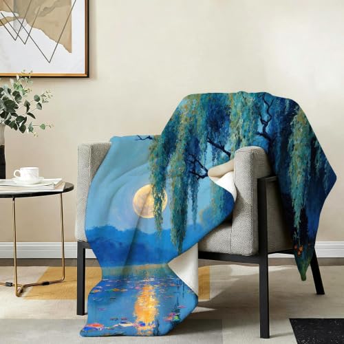 Plaid saule bleu lune en flanelle pour vos soirées cocooning sur le canapé d'angle