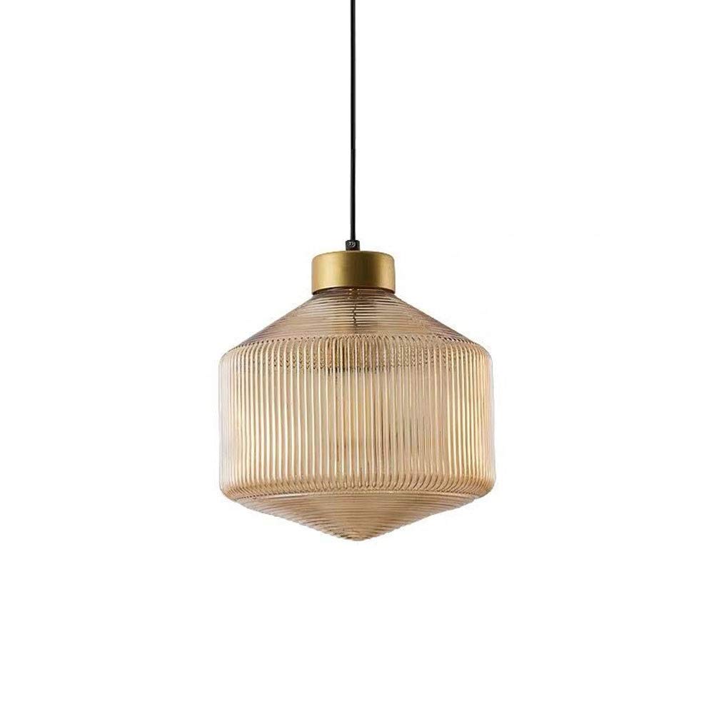 Suspension E27 cuivre pour éclairer un salon sombre avec un plafonnier moderne