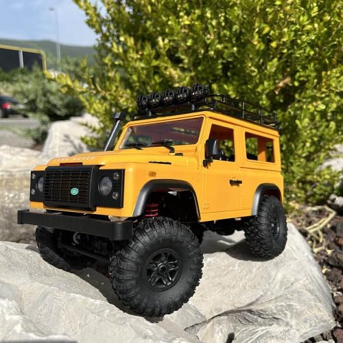 DF-MODELS Land Rover Defender 90 1/12 RTR Crawler from front, on rocks
