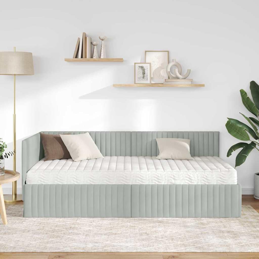 Struttura letto angolare in velluto grigio chiaro con materasso 2 pezzi supporto robusto e testata montata a parete ideale per camere moderne e funzionali