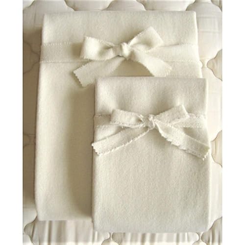 Cozy Buns - Protector de colchón con barrera de humedad para cuna