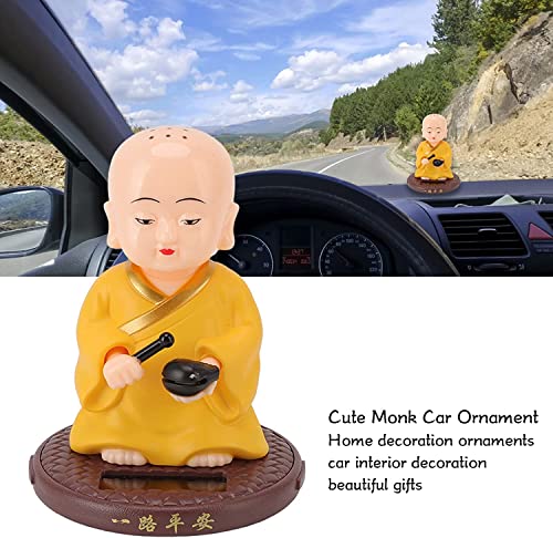 Image of AUGEN Small Buddhist Monk Solar Ornaments, Automatic Nodding Lucky Meaning Light Energy Sensing Eco Friendly Solar Buddhist Monk Statue Decoration for Home Car Dashboard (Pack of 1)(C, Yellow)