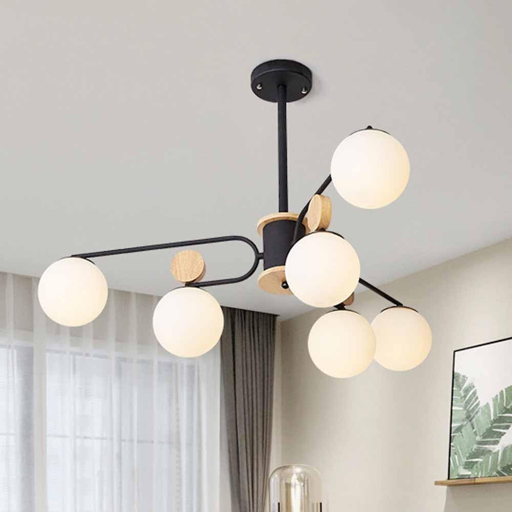 Lustre moderne en métal noir et bois pour illuminer votre cuisine