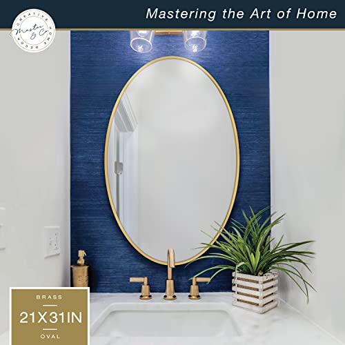 Image of MCS Master & Co. Modern Metal Large Wall Mirror, Minimalist Home Decor Oval Mirror for Living Room, Bedroom, or Bathroom, 21 by 31 Inch, Brass