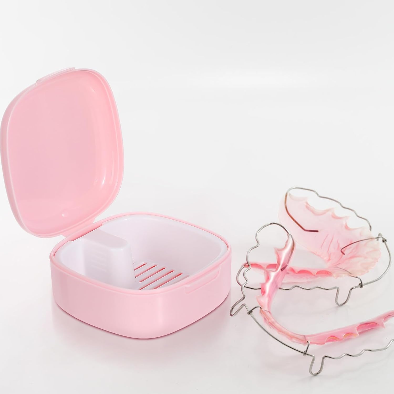 HOMSFOU Portable Pink Retainer Case Featuring Locking Lid and Built-in Drainer Basket, Sturdy Plastic Dentures Box for Travel and Daily Use