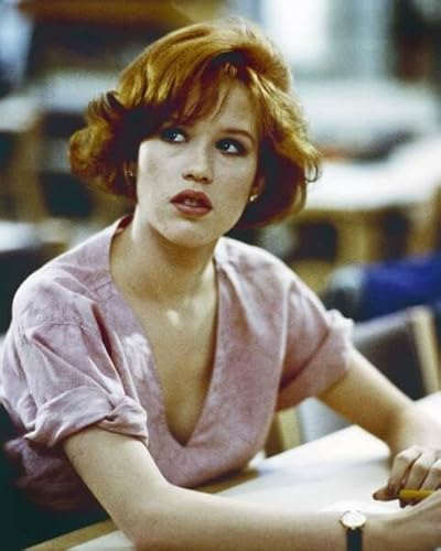 Molly Ringwald sat at school desk as Claire The Breakfast