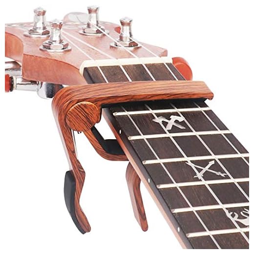 WINGO Cejilla Ukelele Capo para Ukulele, Capotasto de Aleación de Zinc para Soprano/Concierto/Tenor Ukuleles, Madera Color.