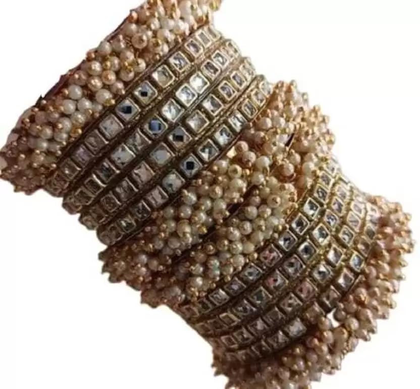 See full amazon price history chart for BANKE BIHARI Kundan Beaded Indian Traditional Panjabi Golden Chudi Chudiya Bangles Set Of 12 (Size: 2.2) BANKE BIHARI Kundan Beaded Indian Traditional Panjabi Golden Chudi Chudiya Bangles Set Of 12 (Size: 2.2) (B0CPYKBNH6) Amazon Price History, Amazon Price Tracker