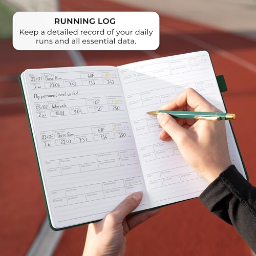 Person using a green pencil to record running details in an open running logbook.