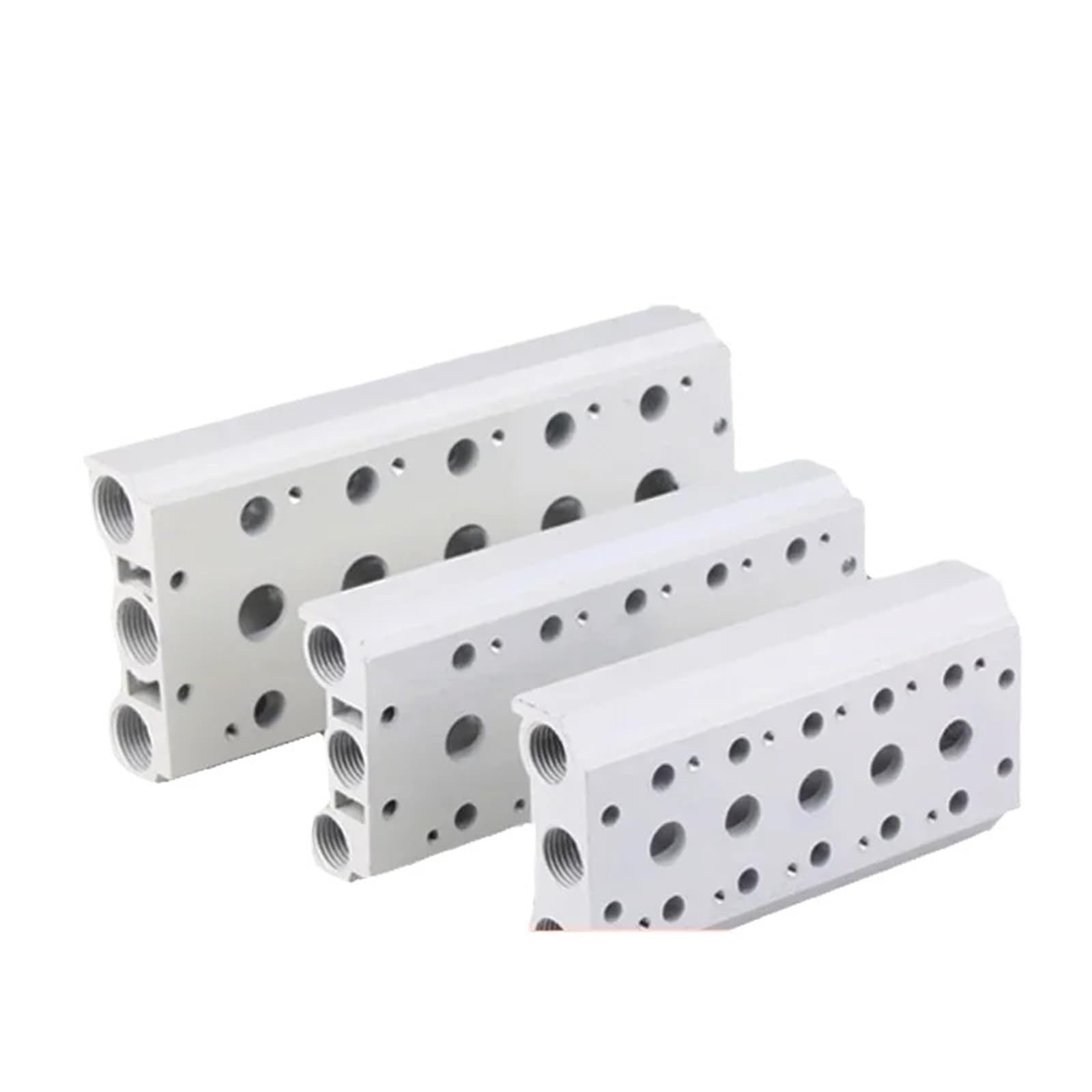 Électrovannes pneumatiques 4V310 installées sur embase 300M en atelier