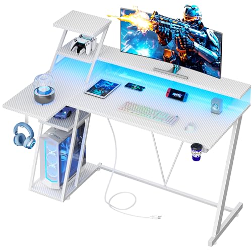 Image of Korfile 47 Inch White Gaming Desk with LED Lights & Power Outlet, L Shaped Gaming Table with Storage Shelves, Gamer Workstations with Monitor Stand for Bedroom