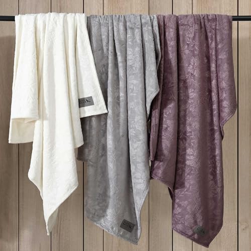 Image of Eddie Bauer - Throw Blanket, Ultra-Soft & Embossed Plush Bedding, Blanket for Couch & Bed (Woodblock Floral Purple, 50 inch x 70 inch)