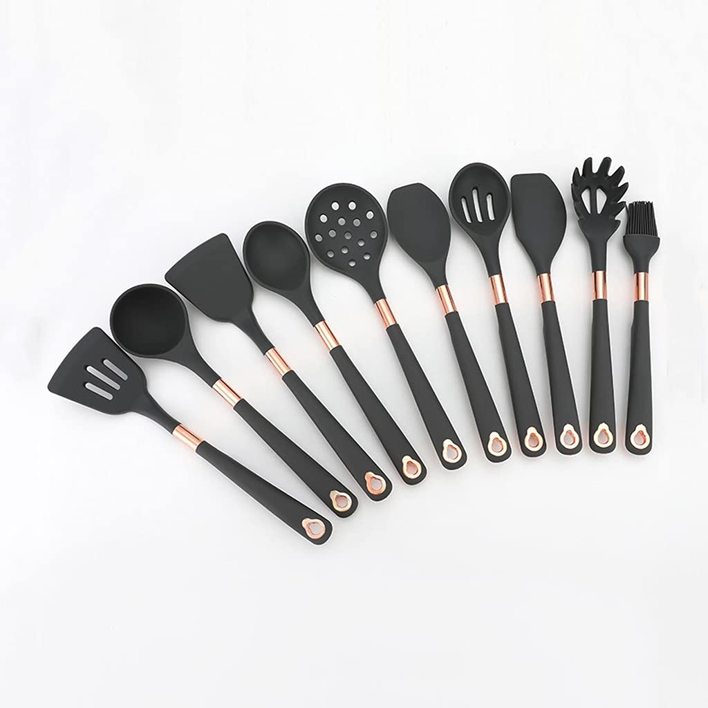 Cuisine en silicone rose avec suspension pour un plan de travail épuré