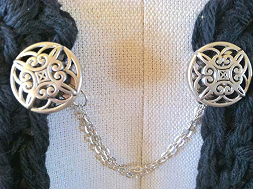The mattie silver tone resin Celtic inspired sweater clip.