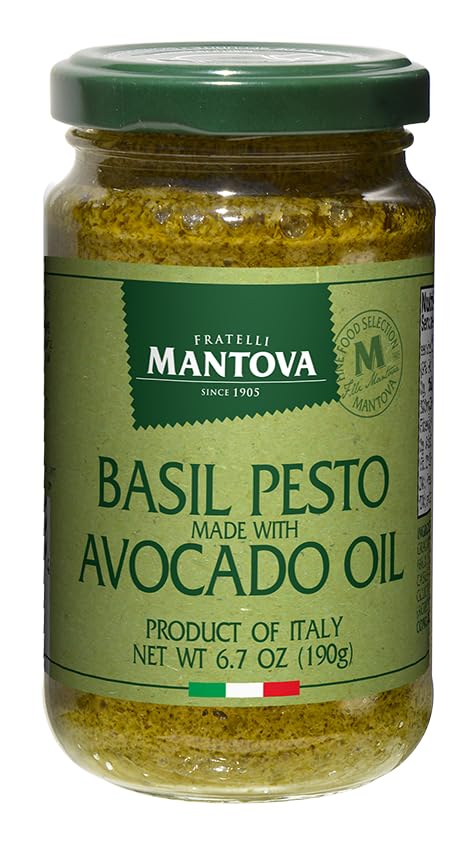 Mantova Basil Pesto with Avocado Oil, 6.7 oz (Pack of 1), combines fresh basil pesto with the velvety richness of avocado oil for a smooth, buttery finish. Ideal for heart-healthy recipes, this pesto pairs beautifully with pasta, toast, or as a dip for veggies. It's a nourishing, flavor-forward update on the classic.