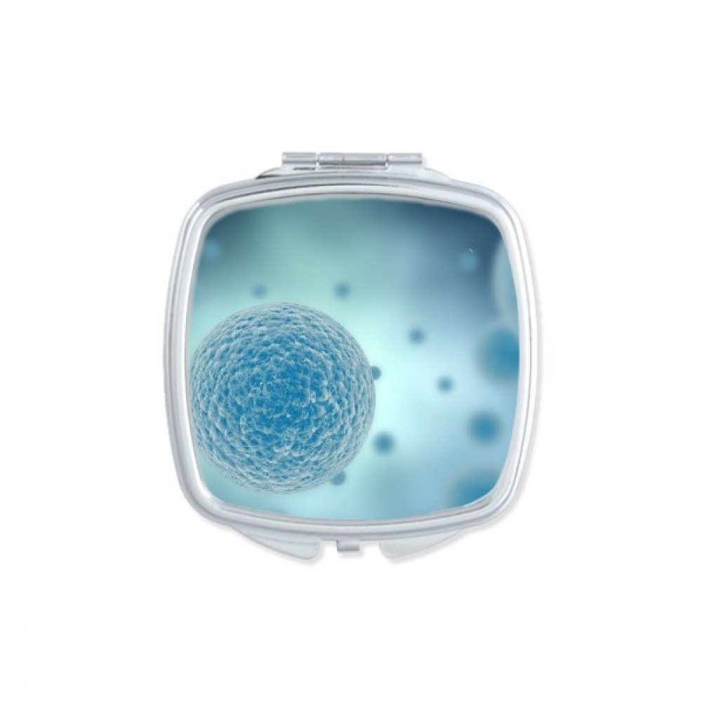 Miroir de poche à la main motif cellules bleues avec double réflexion nette pour cosmétique