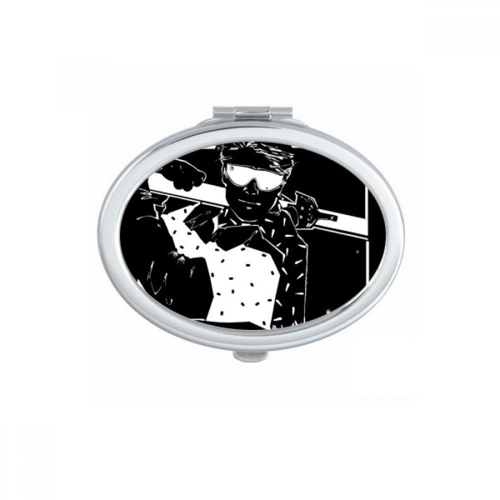 Miroir compact ski noir pour retouches maquillage en station de sports d'hiver