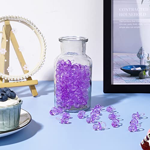 Image of XINHUIDALSQ 150 Mini Acrylic Pacifiers for Baby Shower Girl Game, 0.86 Inch Bulk Chupones para Gender Reveal Party Favors Table Decoration (Purple)