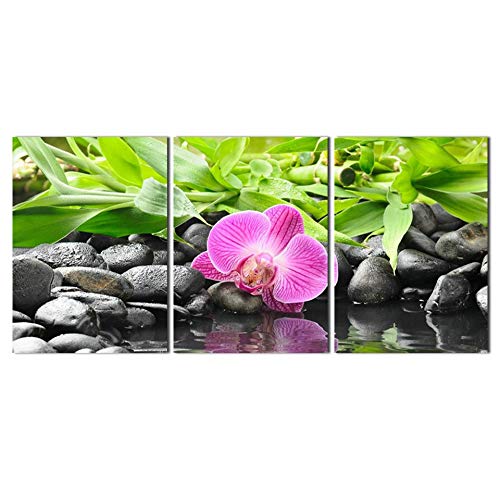 Tableau sur toile déco fleur zen et pierre noire pour créer une ambiance sereine chez soi
