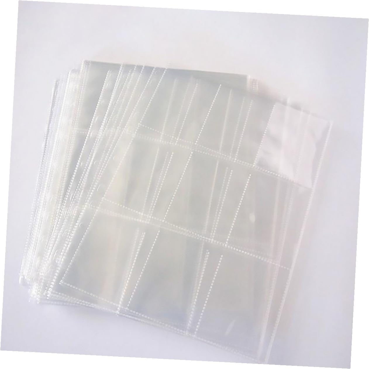 UPKOCH 50pcs A4 Plastic Photo Album Sleeves 9-Pocket Loose Leaf Photo Storage Pages Compatible with 3-Ring Binders for 3-inch