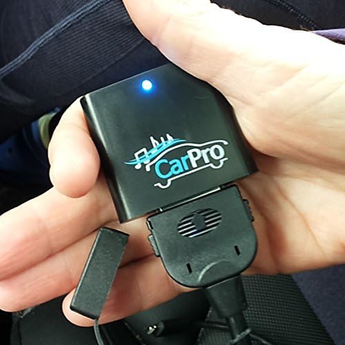 Hand holding CoolStream CarPro adapter connected to a 30-pin cable