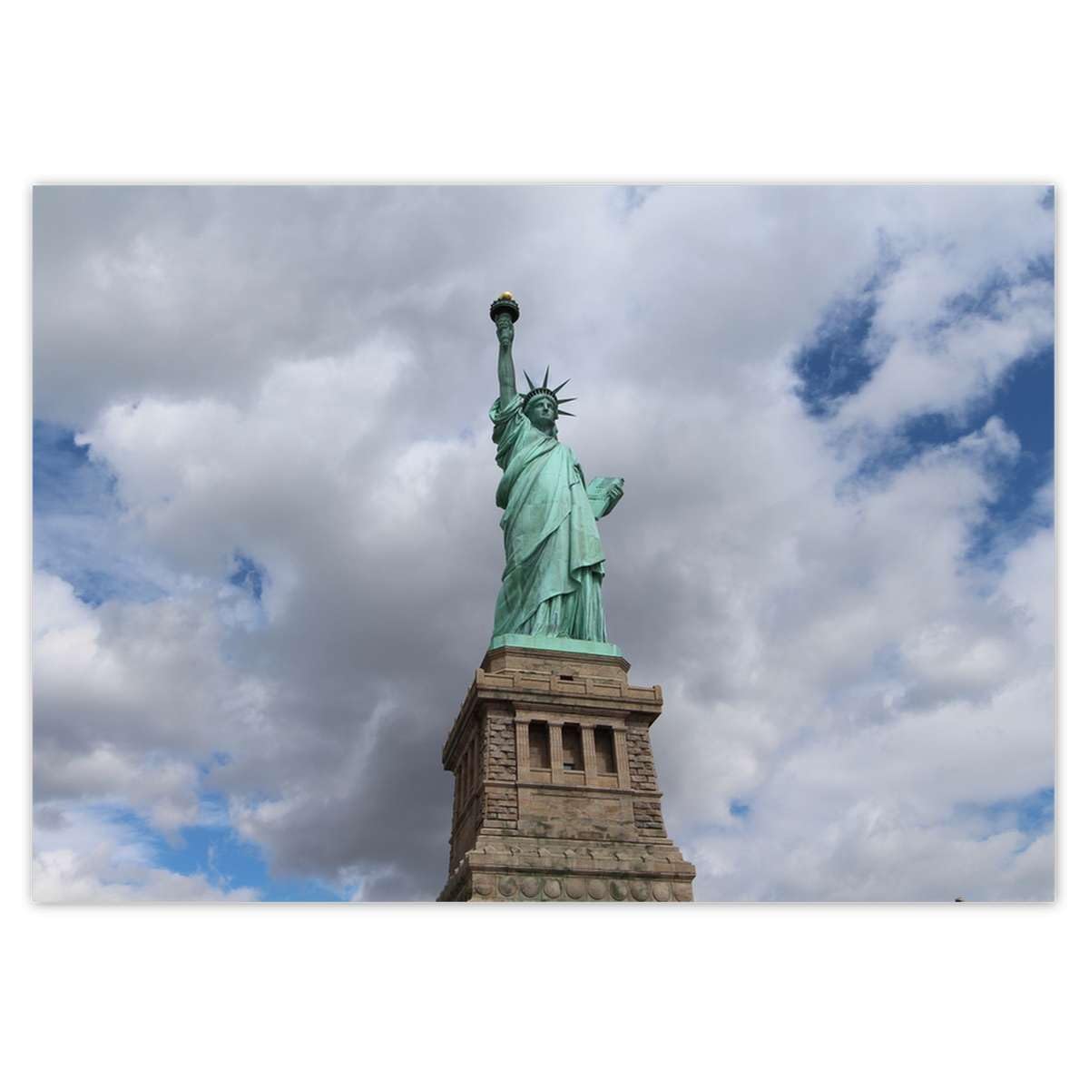 Papier peint intissé statue de la Liberté pour masquer mur abîmé